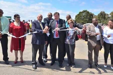 Lincoln de Bryn, Mayor of the Overberg District Municipality, Reverend D Dietrich, Minister  Grant  and  Nicolette  Botha-Guthrie,  Mayor  of  the  Overstrand  Local  Municipality, flanked by municipal officials and guests.